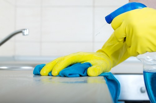 Cleaning team reviewing safety procedures and public liability cover